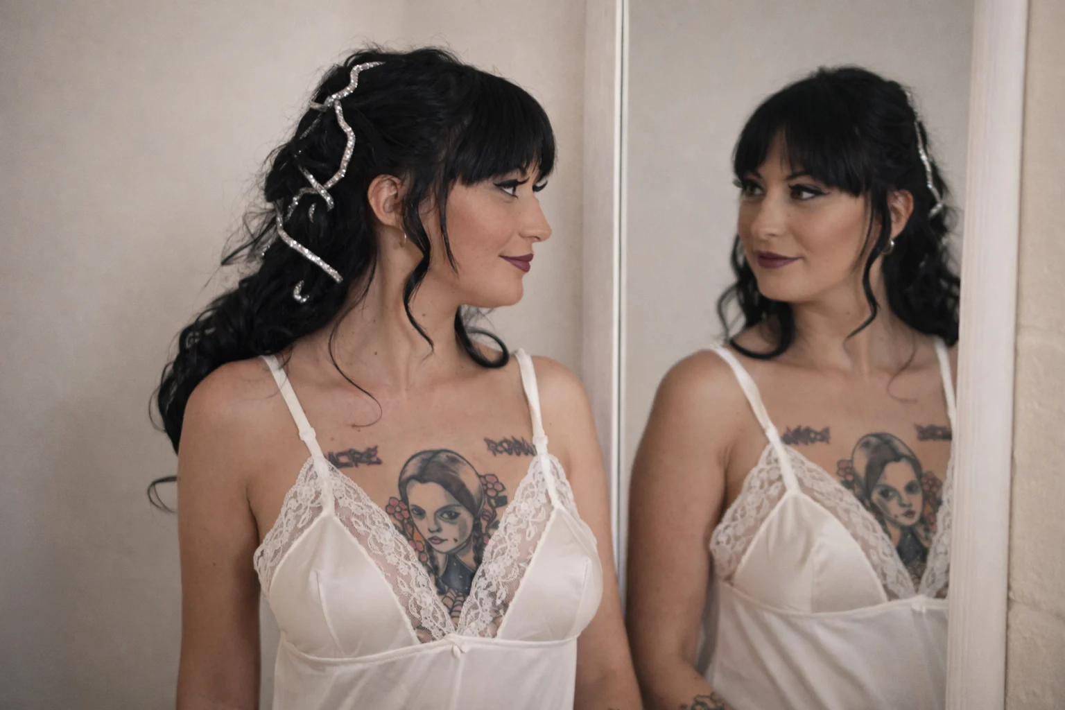 Bride looking at her reflection in the mirror during wedding preparation in the Ruhrgebiet, NRW, Germany