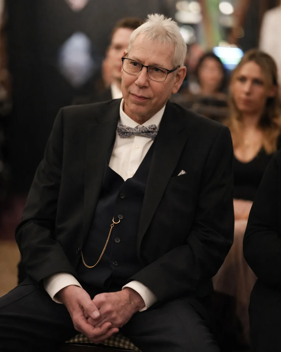 Emotional father of the bride sitting during wedding ceremony in elegant venue in Hamburg Germany